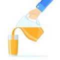 hand pouring orange fruit juice Royalty Free Stock Photo