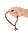 Hand with prayer beads Royalty Free Stock Photo