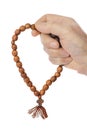 Hand with prayer beads Royalty Free Stock Photo