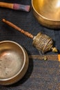 Hand prayer wheel and Tibetan Singing bowls Royalty Free Stock Photo