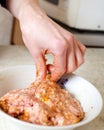 Hand preparing mince