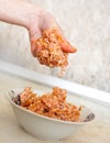 Hand preparing mince