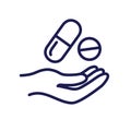 Hand with prescription drugs - pill tablets & capsules