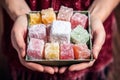 hand presenting a box of turkish delight as a gift Royalty Free Stock Photo