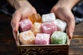 hand presenting a box of turkish delight as a gift Royalty Free Stock Photo