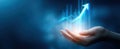 The hand presenting a glowing upward growth graph for business success.AI generated image Royalty Free Stock Photo
