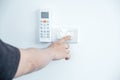 Hand press turn off the home light switch Concept of environmental preservation and energy saving Royalty Free Stock Photo