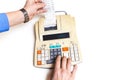 Hand presses cash register keys another takes out check Royalty Free Stock Photo