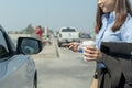 Hand pressing button remote to lock or unlock a car Royalty Free Stock Photo