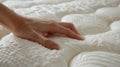 Hand Pressing Soft Mattress. AI generated Royalty Free Stock Photo