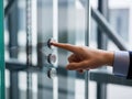 Hand pressing elevator button Royalty Free Stock Photo