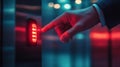 A hand pressing the elevator button in a modern building during evening hours Royalty Free Stock Photo