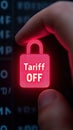 Hand pressing glowing red lock icon with Tariff OFF text, symbolizing deactivation, digital Royalty Free Stock Photo