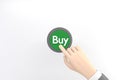 Hand pressing the green buy button on white background.3D rendering Royalty Free Stock Photo