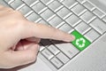 Hand pressing on green recycle sign button Royalty Free Stock Photo