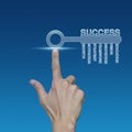 Hand pressing key with business words over blue background, Success business concept Royalty Free Stock Photo