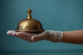 Hand pressing service bell a metaphor for requesting maintenance or waitstaff assistance Royalty Free Stock Photo