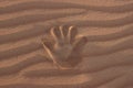 Hand print in sand Royalty Free Stock Photo