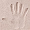 Hand print in sand Royalty Free Stock Photo