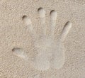 Hand print in sand Royalty Free Stock Photo