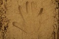 Hand print in the sand Royalty Free Stock Photo