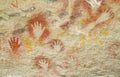 Hand prints on a cave wall cueva de las manos Royalty Free Stock Photo