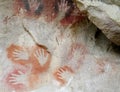 Hand prints on a cave wall
