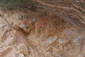 Hand prints of unknown people on rock in desert Royalty Free Stock Photo