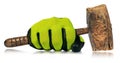 Hand with Protective Work Glove Holding an old Wooden Mallet or Hammer