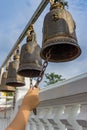 Handle ringing a bell in a Buddhist temple Royalty Free Stock Photo