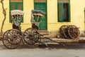 Hand pulled rickshaws are parkedon the street. Kolkata. India