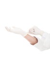 Hand pulling on white surgical gloves