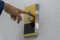 Hand push the elevator button up Royalty Free Stock Photo
