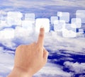 Hand pushing button on blue sky Royalty Free Stock Photo