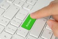 Hand pushing green access button Royalty Free Stock Photo