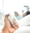 Hand pushing nurse call button Royalty Free Stock Photo