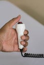 Hand pushing nurse call button Royalty Free Stock Photo