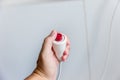hand pushing nurse call button . patient press red emergency button to calling nurse for help in hospital. Royalty Free Stock Photo