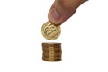 Hand put coin on a stack of coins money value buisness finance