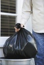 Hand Putting Garbage Bag Into Trash Can Royalty Free Stock Photo