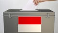 Ballot box with flag of Indonesia, election related 3d rendering