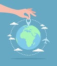 A hand putting a pin icon on the Earth globe and an airplane flying around. Flat vector illustration Royalty Free Stock Photo