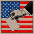 Hand putting voting paper on the USA flag background Royalty Free Stock Photo