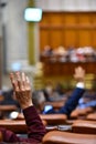 Hand raised in the air during a voting procedure Royalty Free Stock Photo