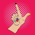 Hand with raised index finger on the bright pink background and white points in the background. Call attention and Royalty Free Stock Photo