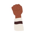 Hand raised up with clenched fist of African person, fighting against race discrimination. Human arm rising high for BLM