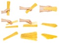 Hand with raw golden spaghetti, set and collection