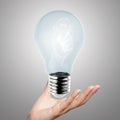 Hand reach light bulb of leadership Royalty Free Stock Photo