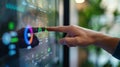 A hand reaches in to swipe a sleek touchscreen interface on a home energy storage unit showing a graph of energy