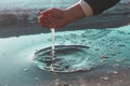 Hand reaching for fresh water